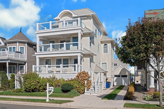 view of front of house with a balcony and a garage