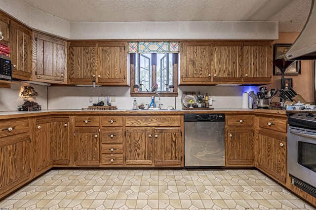 kitchen with ventilation hood, sink, a textured ceiling, and appliances with stainless steel finishes