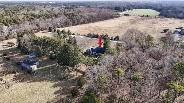 birds eye view of property with a rural view