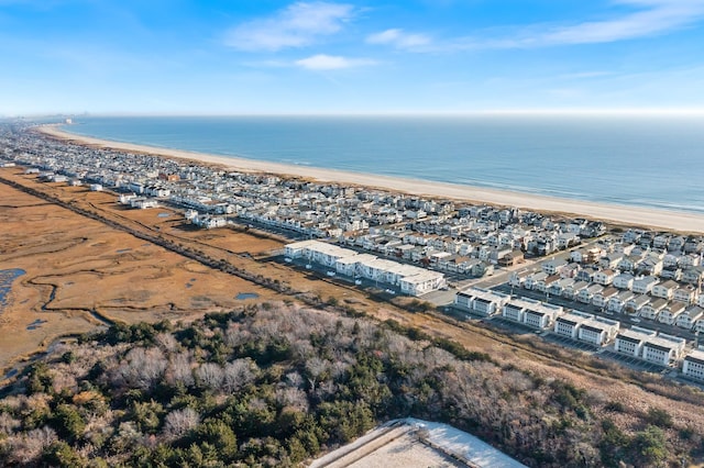 aerial view featuring a water view and a beach view