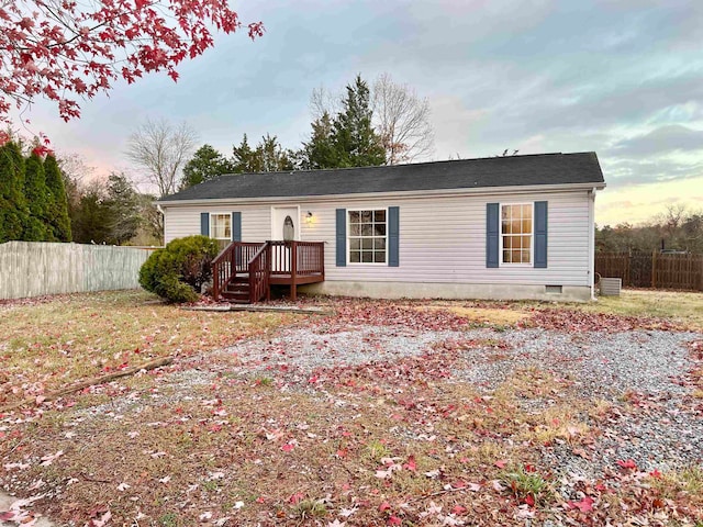 view of front of home with a deck