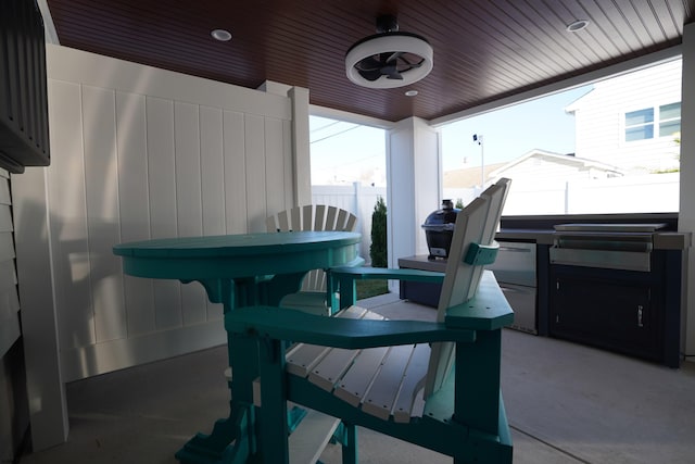 view of patio featuring ceiling fan