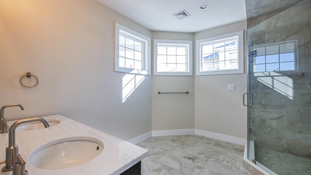 bathroom with vanity and walk in shower