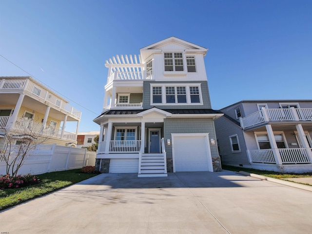 view of front of home with a porch and a garage