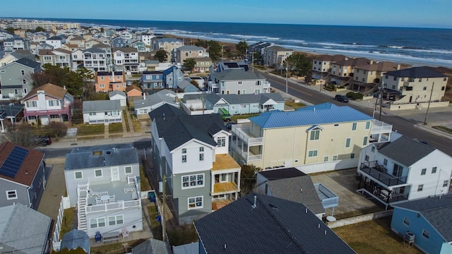 aerial view with a view of the beach and a water view