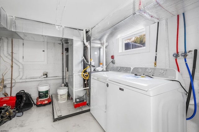 laundry room featuring washer and clothes dryer