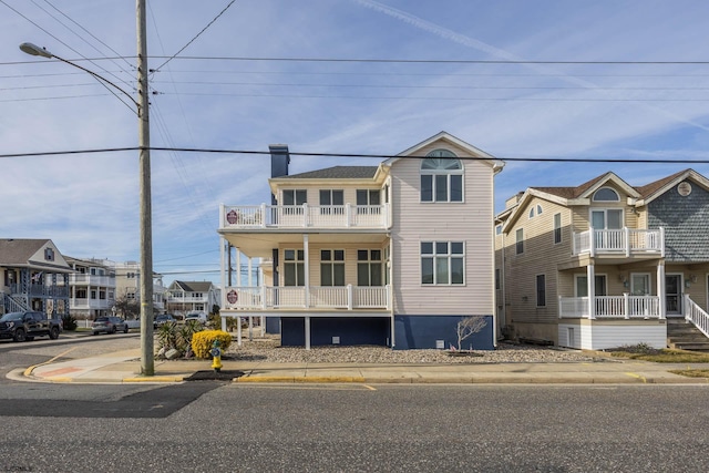 view of front facade with a balcony