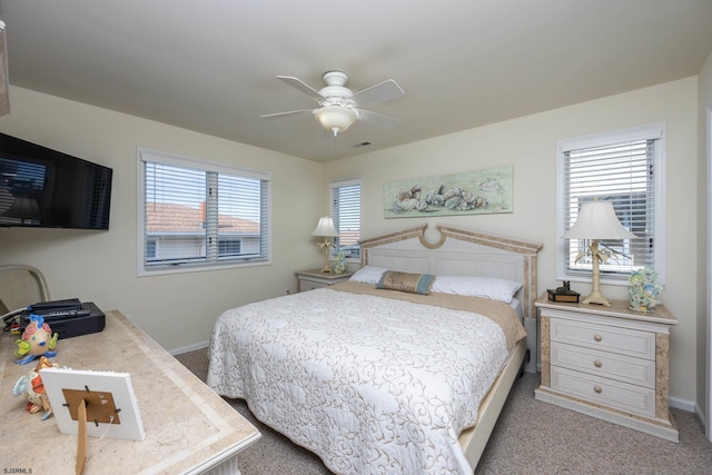 carpeted bedroom with ceiling fan