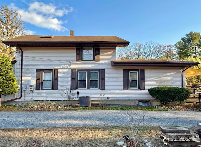 view of side of property with central AC