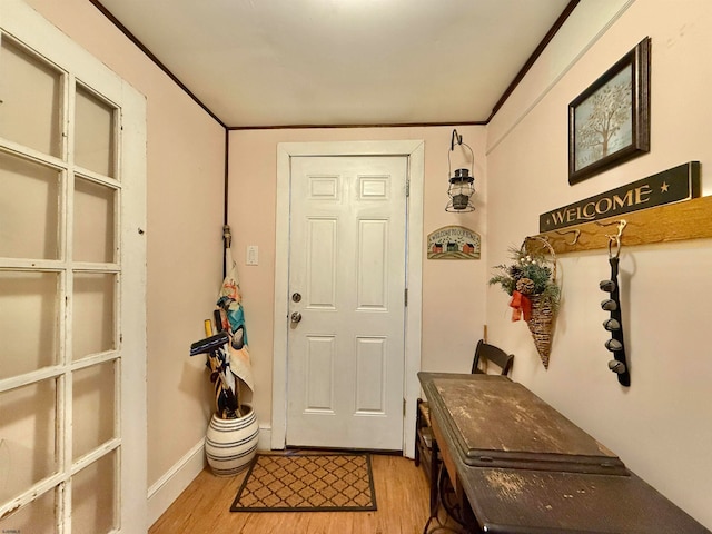 doorway to outside with light hardwood / wood-style floors