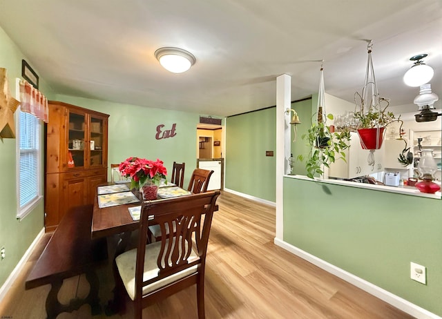 dining room featuring light hardwood / wood-style floors