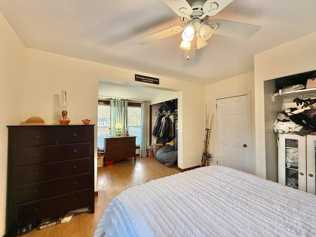 bedroom featuring ceiling fan and light wood-type flooring