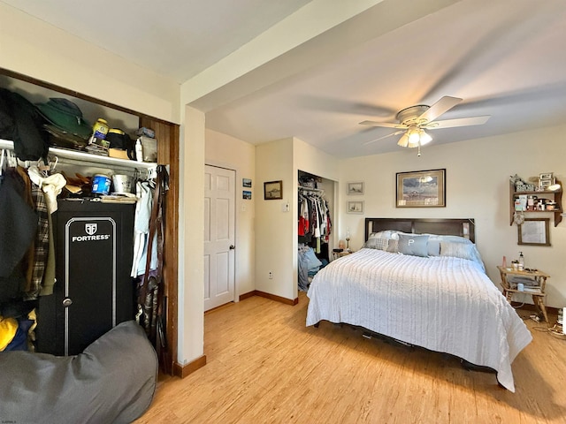 bedroom featuring light hardwood / wood-style floors and ceiling fan