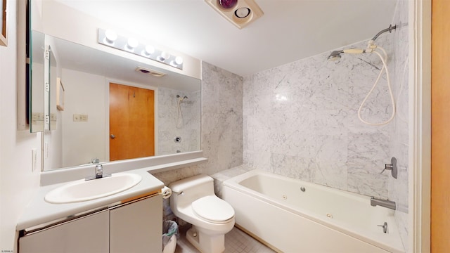 full bathroom with vanity, shower / tub combination, tile patterned floors, toilet, and tile walls