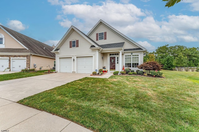 front of property featuring a front yard and a garage