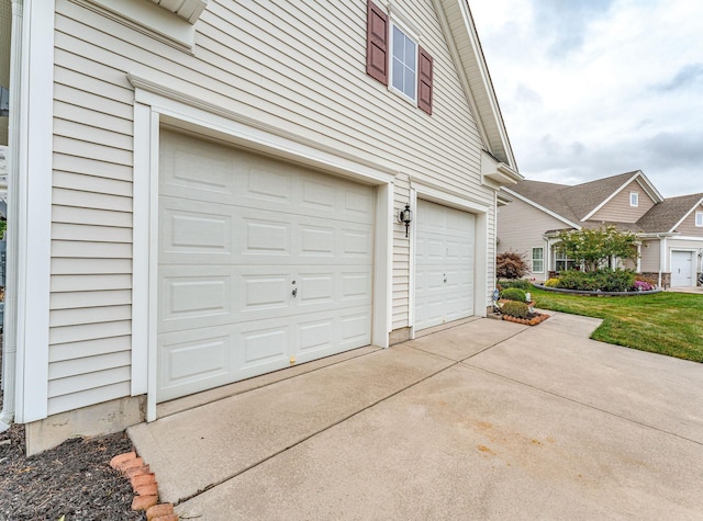 garage featuring a yard