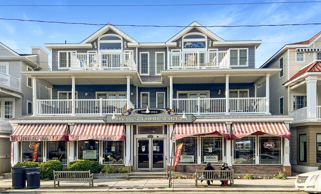 exterior space featuring a balcony and central AC