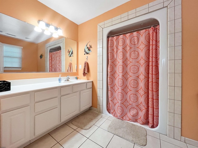 bathroom with vanity and tile patterned floors