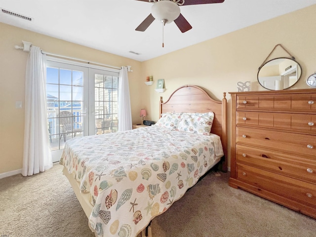 carpeted bedroom with access to outside and ceiling fan