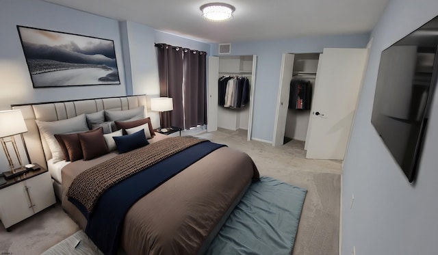 carpeted bedroom with two closets