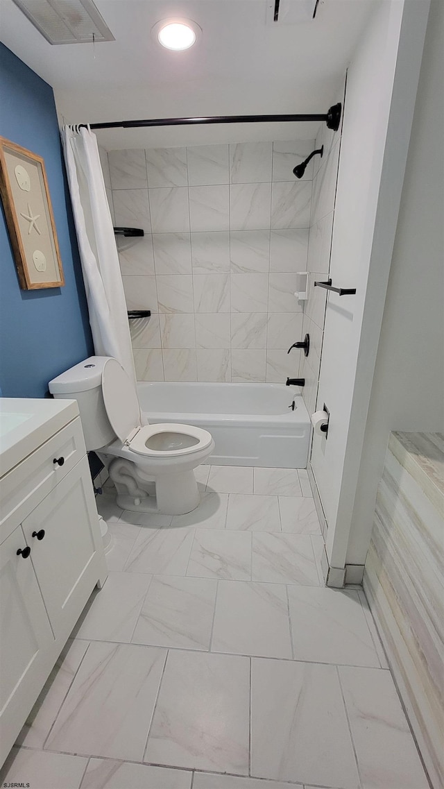 full bathroom featuring shower / bathtub combination with curtain, vanity, and toilet