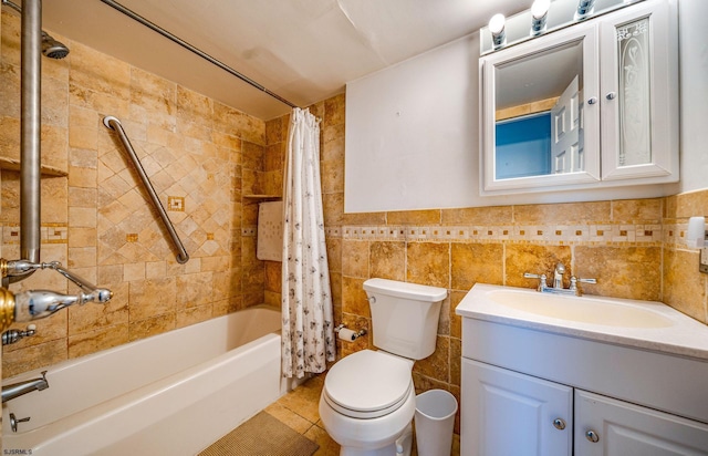 full bathroom featuring vanity, tile patterned floors, shower / bath combination with curtain, toilet, and tile walls