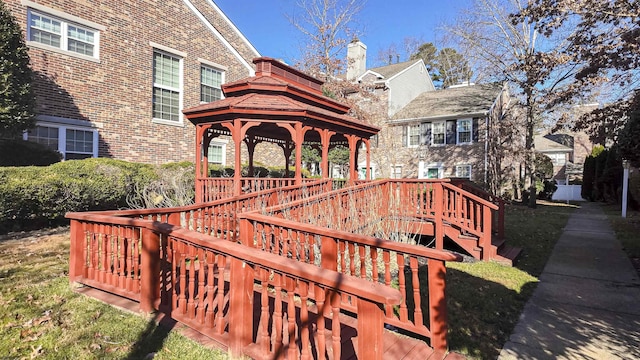 wooden deck with a gazebo