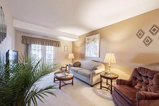 living room featuring carpet floors