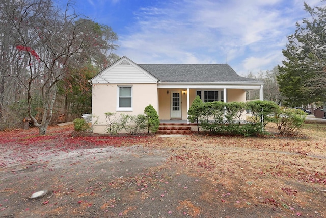 view of front of property featuring covered porch