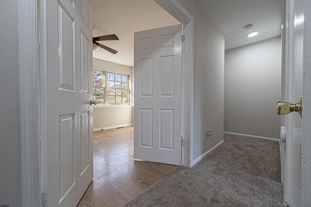 hallway featuring light hardwood / wood-style flooring