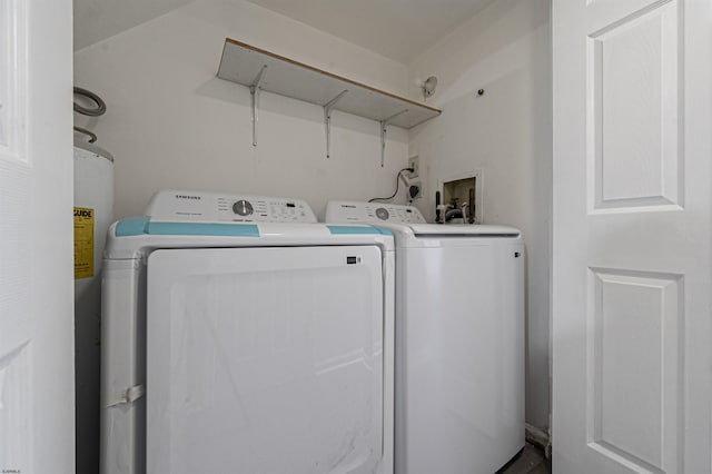 laundry room with separate washer and dryer