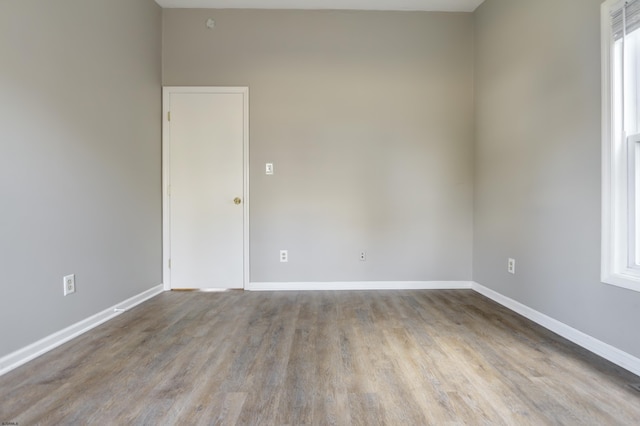 empty room with light wood-type flooring