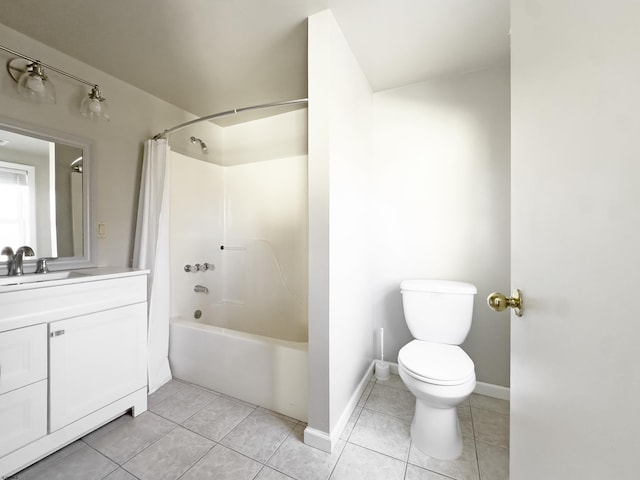 full bathroom featuring toilet, shower / bath combo, vanity, and tile patterned floors