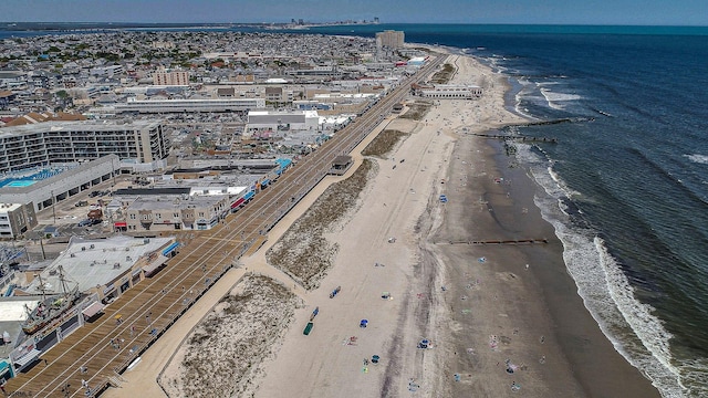 aerial view featuring a beach view and a water view