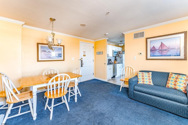 carpeted dining space featuring a chandelier and ornamental molding