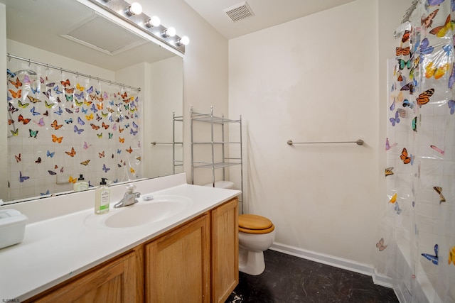 bathroom with vanity, curtained shower, and toilet