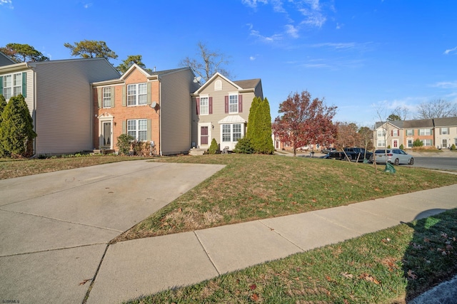 view of front of home featuring a front lawn