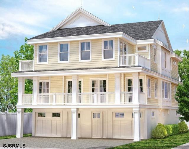 view of front facade with a garage and a balcony