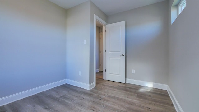 unfurnished room featuring light wood-type flooring