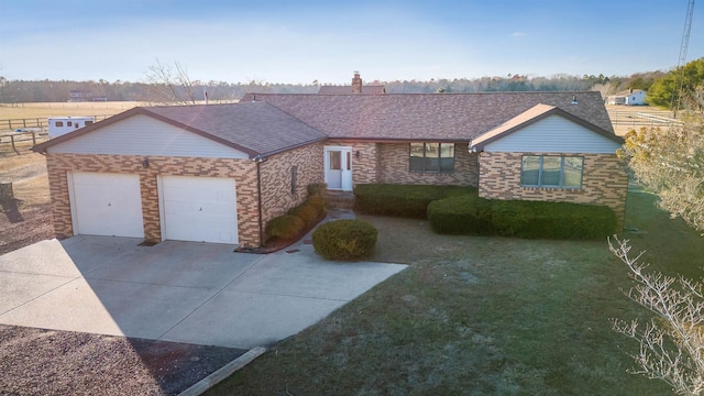 single story home featuring a garage