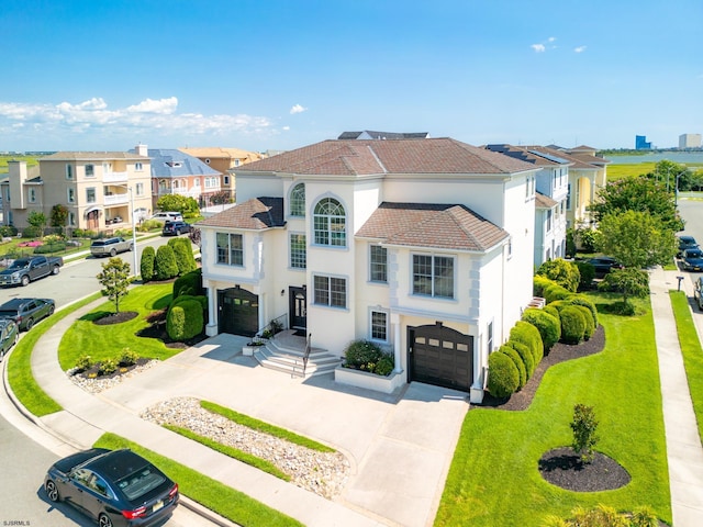 mediterranean / spanish-style home featuring a garage