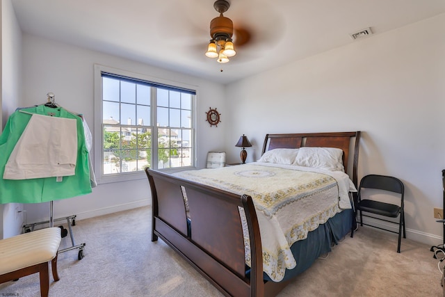 carpeted bedroom with ceiling fan