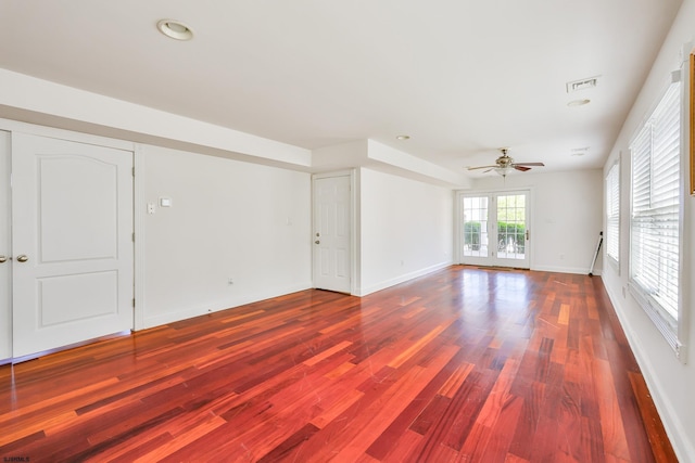 spare room featuring ceiling fan and hardwood / wood-style floors