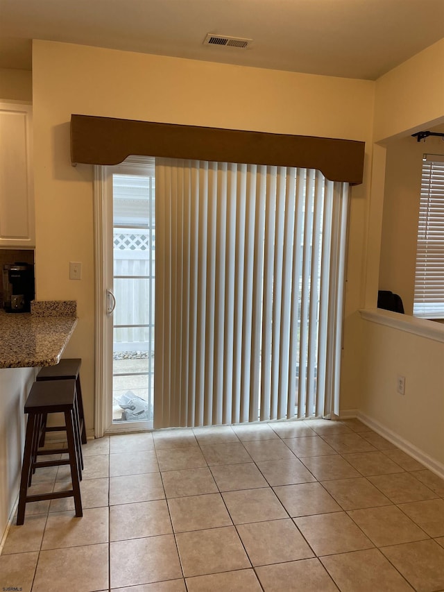 view of tiled dining space