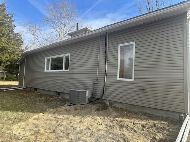 view of home's exterior with central AC