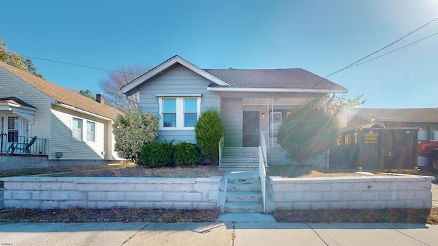 bungalow-style home with covered porch