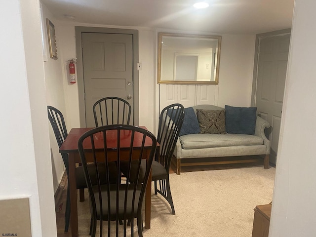 view of carpeted dining space