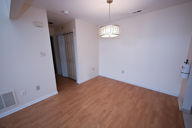 empty room featuring light hardwood / wood-style flooring