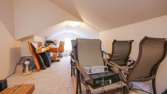 interior space featuring vaulted ceiling