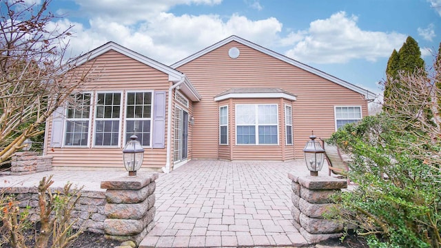 back of house featuring a patio